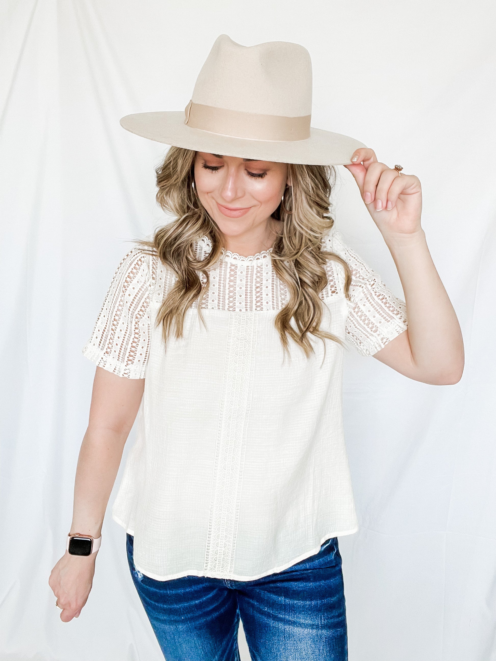 Lacey spring top ivory color with lace detailing on neckline and shoulders