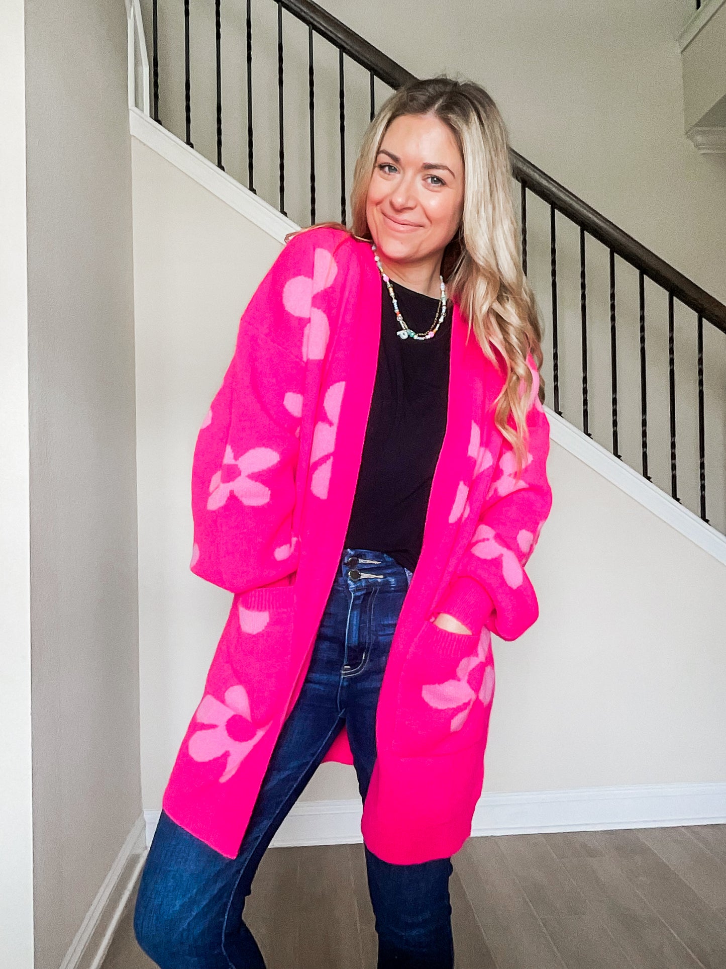 Enough Anyways Floral Cardigan in bright pink and soft pink flowers with two pockets