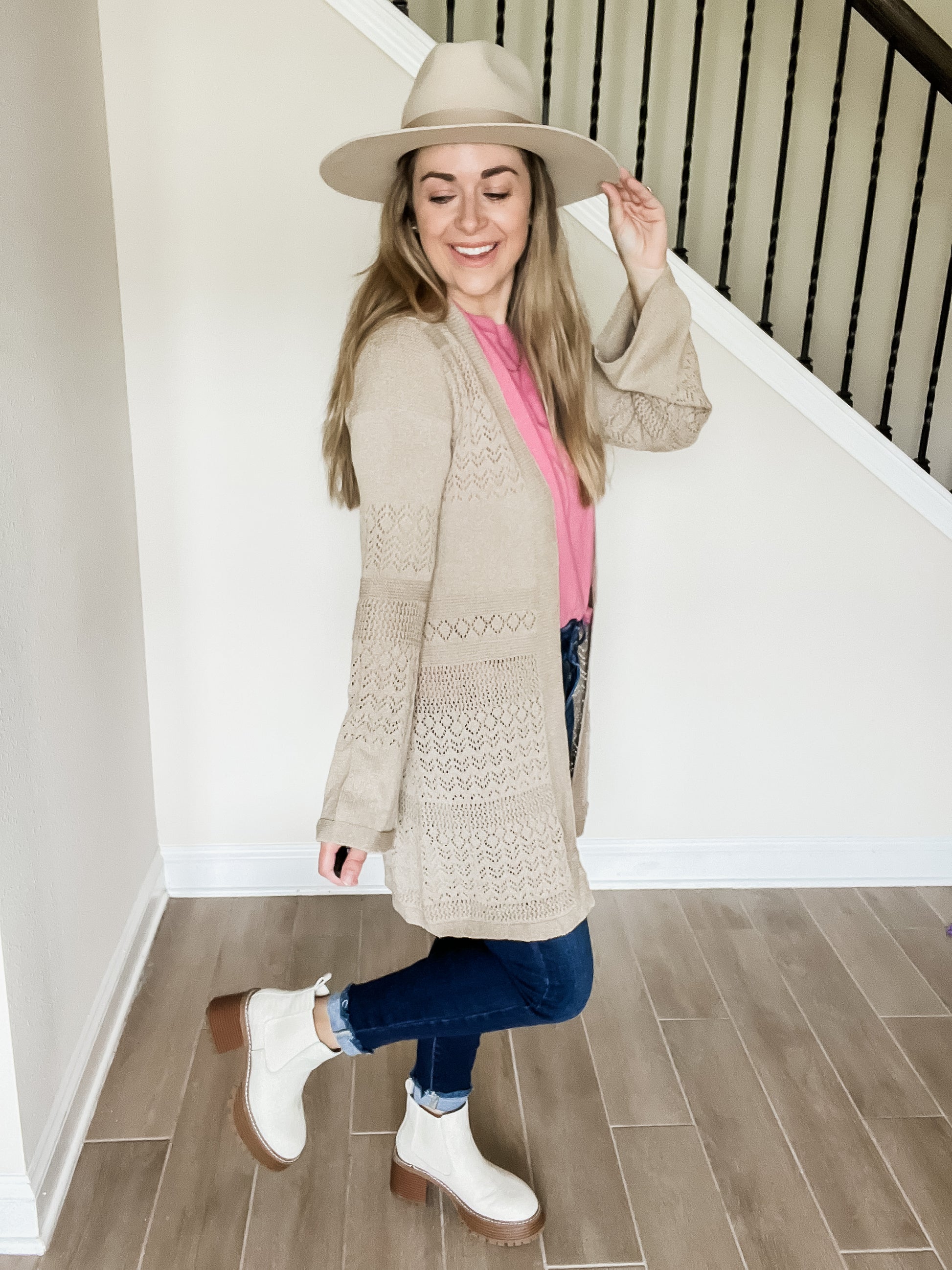 kindly knit cardigan in taupe color with elegant knitted material that is longer length. 