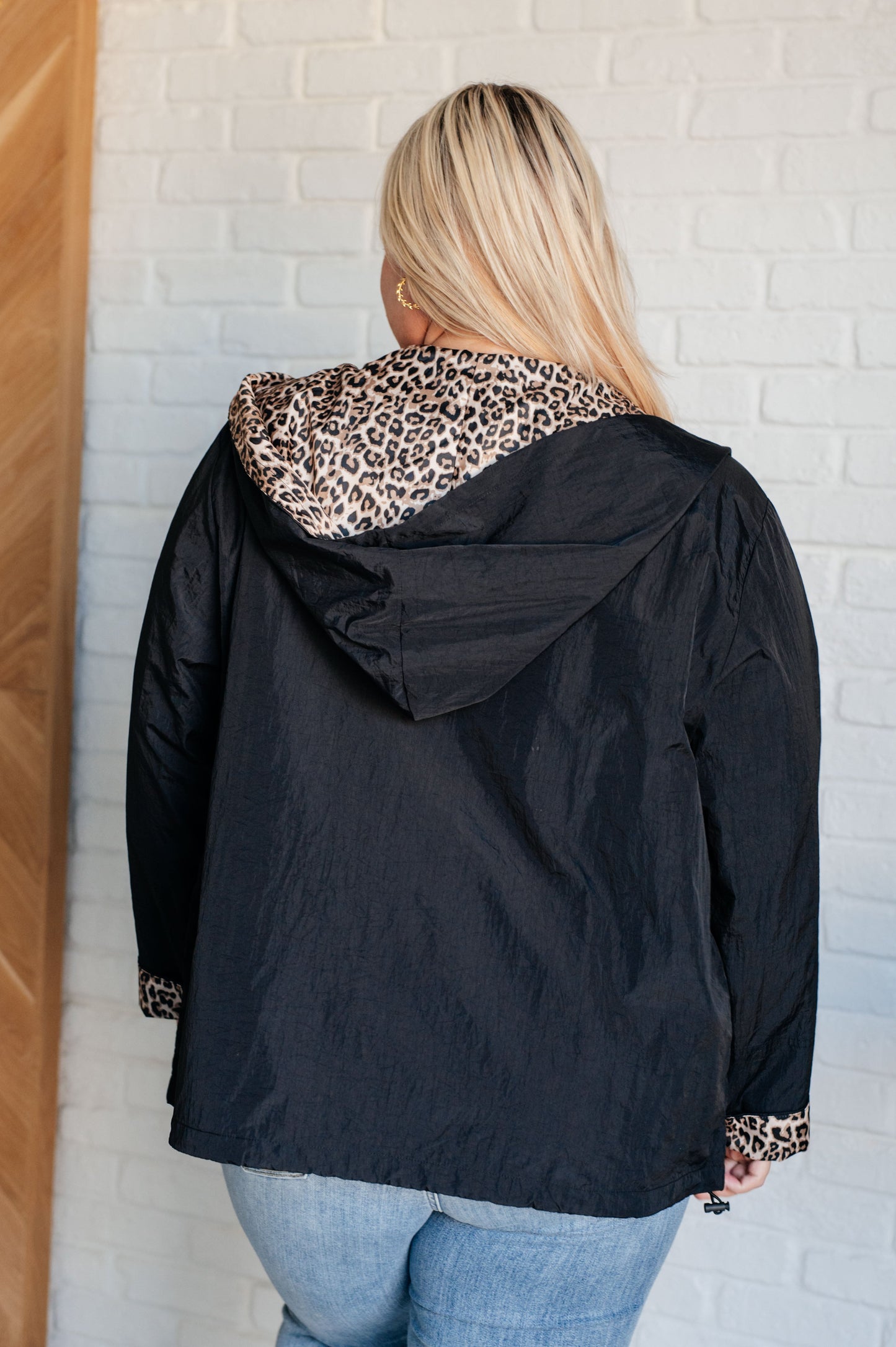 backview Let's Get Wild Hooded Windbreaker in black with cheetah print lining in XL