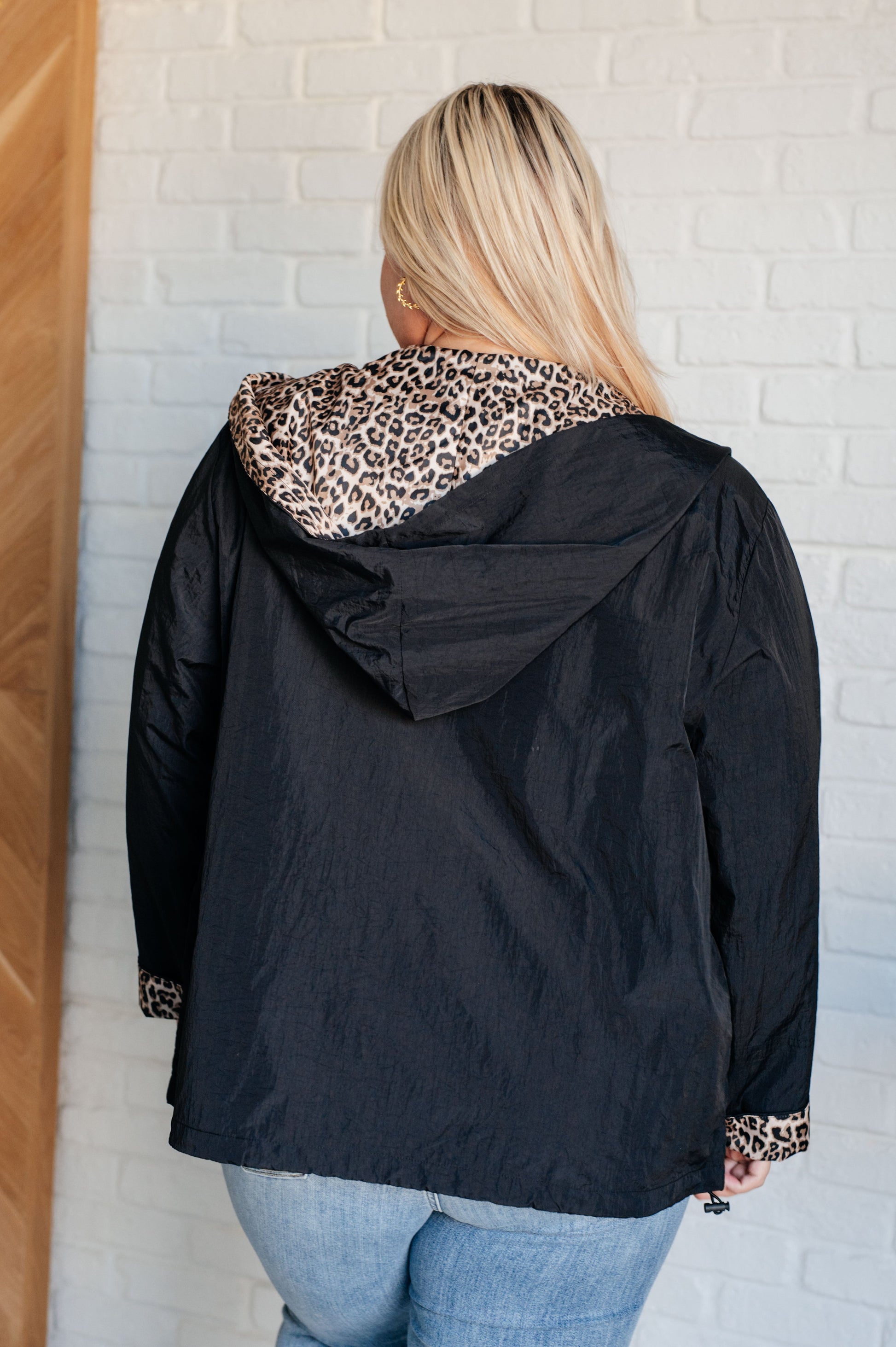 backview Let's Get Wild Hooded Windbreaker in black with cheetah print lining in XL