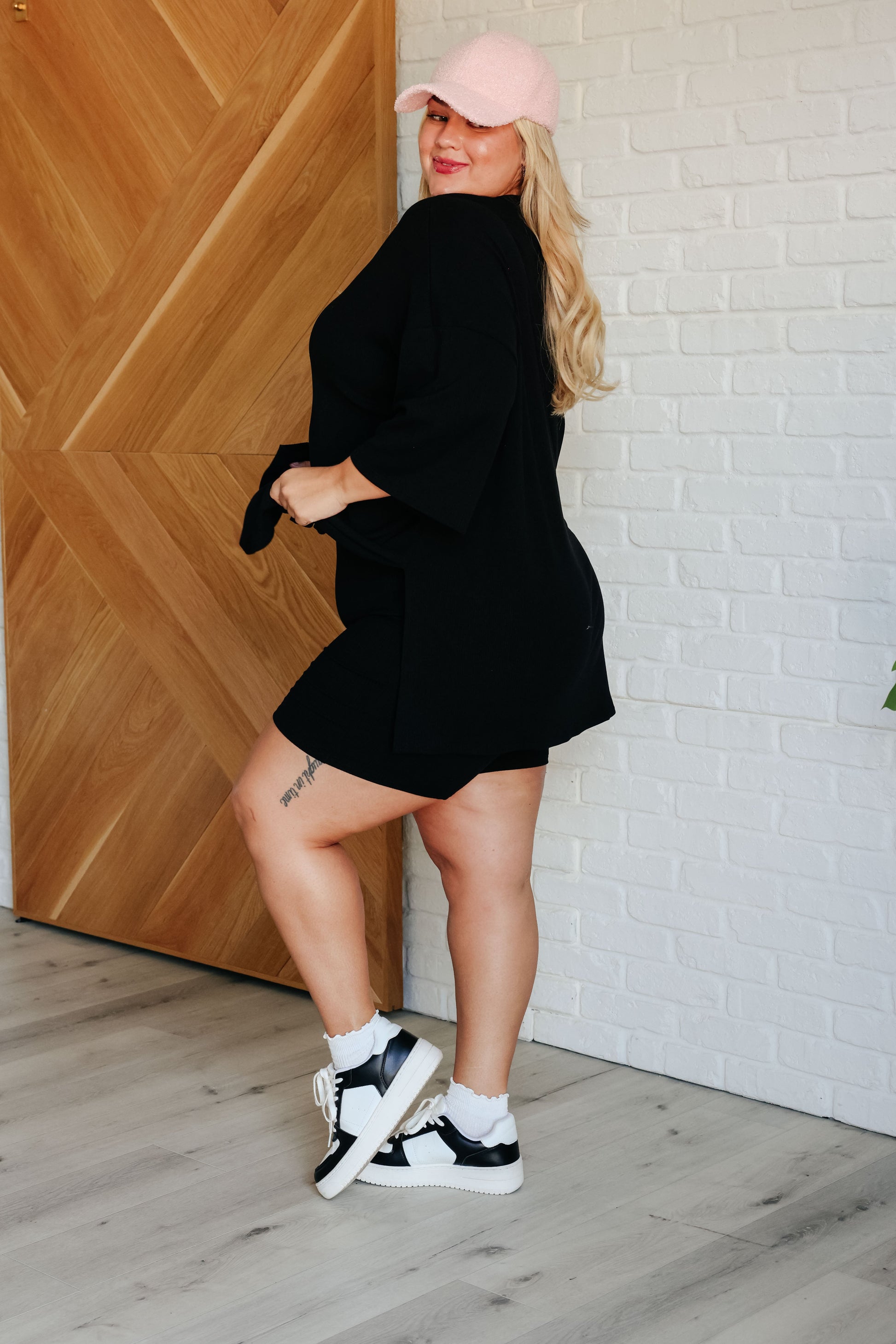 styling of black oversized tee + biker shorts in size XL