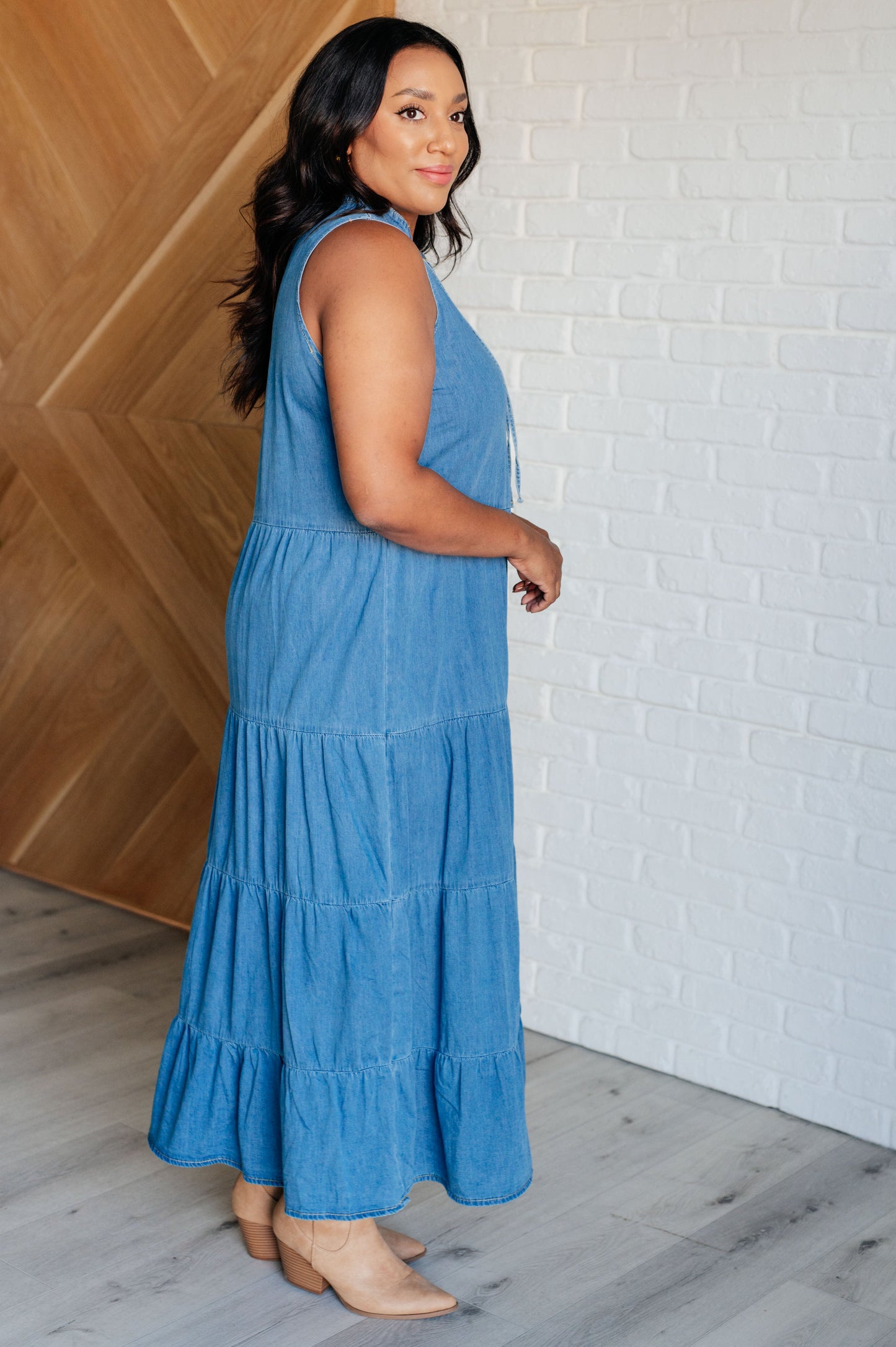 side view of blue denim maxi dress