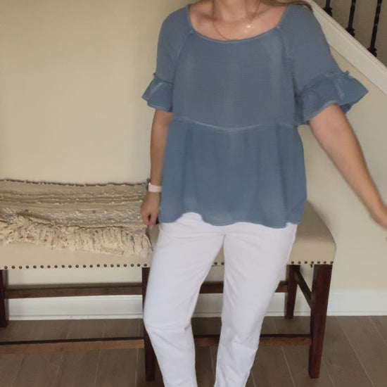 video of flowy movement of peplum top